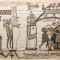 De oudste bekende afbeelding van de komeet van Halley op het tapijt van Bayeux met gebeurtenissen in het jaar 1066. (c) Wikimedia commons
