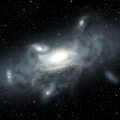 Impressie van hoe ons Melkwegstelsel er in zijn vroege jeugd uitzag. Vijf kleine satellietstelsels staan op het punt om opgeslokt te worden. © James Josephides, Swinburne University
