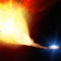 Artist’s impression van een dubbelstersysteem waarin een normale ster materie overdraagt aan een witte dwerg. Dat kan uiteindelijk leiden tot een supernova-explosie van type Ia.  © ESA/Justyn R. Maund (University of Cambridge)