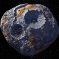 Artist’s impression van planetoïde Psyche, die grotendeels uit (roestend) metaal zou kunnen bestaan.  © Maxar/ASU/P. Rubin/NASA/JPL-Caltech