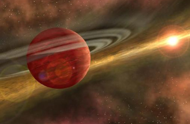 Artistieke impressie van planeetvorming in de stofschijf rond een jonge ster. © NASA/JPL-Caltech/R. Hurt