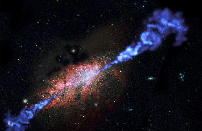 Een artist's impression van een radiosterrenstelsel waarin zich snel sterren vormen. De radiostraling is in blauw; in het sterrenstelsel zijn veel felle nieuwe sterren te zien. Credit: ESA/NASA/RUG/MarcelZinger