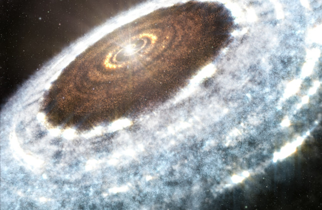 Deze artist’s impression toont de sneeuwgrens van water rond de jonge ster V883 Orionis, zoals gedetecteerd met ALMA. (c) A. Angelich (NRAO/AUI/NSF)/ALMA (ESO/NAOJ/NRAO)