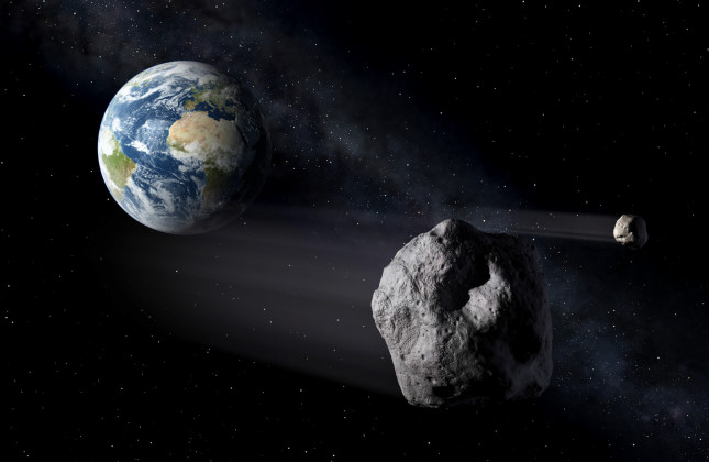 Artistic impression of two near earth objects. Credit: ESA / P. Carril