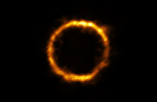 Gelensd beeld van een extreem ver sterrenstelsel dat verrassend veel op onze Melkweg lijkt. Credit: ALMA (ESO/NAOJ/NRAO), Rizzo et al.