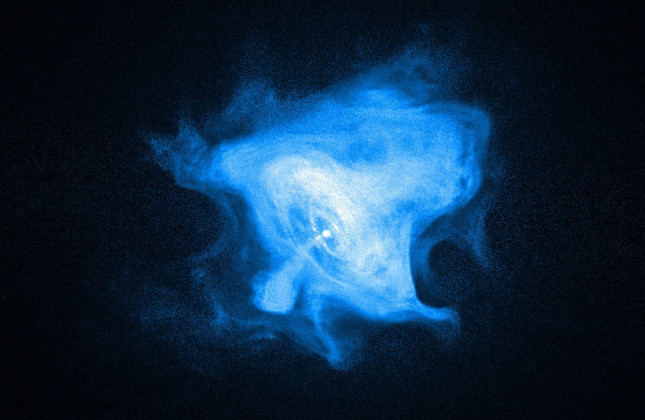 Röntgenopname van de zogenoemde pulsar in de Krabnebel. Om de compacte ster in het midden draait veel materie. (c) NASA/CXC/SAO/F.Seward et al.