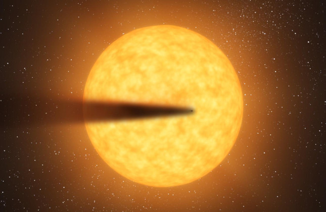 Artistieke impressie van een komeetachtige staart van een mogelijke, uiteenvallende kandidaat-planeet ter grootte van Mercurius terwijl deze voor zijn moederster langs beweegt.  Credit: NASA/JPL-Caltech