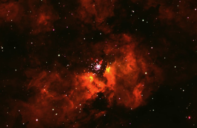 Het gebied rond NGC 3603 is omgeven door geïoniseerd waterstofgas (rood). De ster A1 bevindt zich in de centrale sterrenhoop. © N. Morrell, K. Farrell, Las Campanas 1-meter telescope (processed by P. Massey).