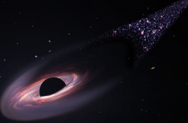 Artist’s impression van een superzwaar zwart gat dat uit zijn moederstelsel verstoten is. © NASA, ESA, Leah Hustak (STScI)