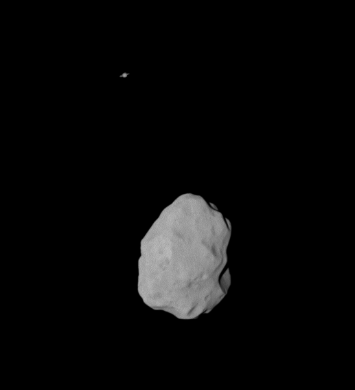 Planetoïde Lutetia met Saturnus op de achtergrond (credit: ESA)