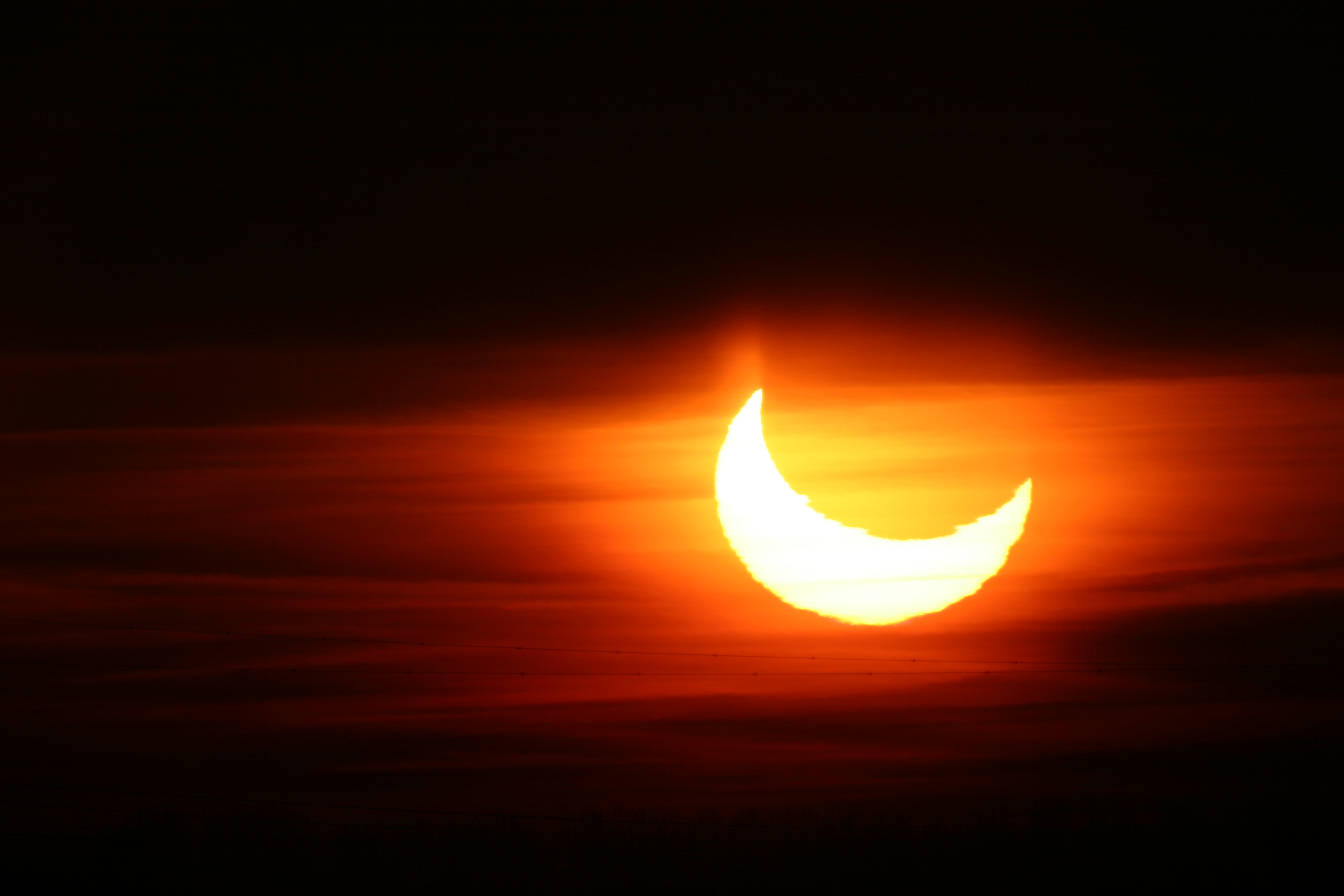 De gedeeltelijke zonsverduistering van 4 januari 2011. Copyright: Jaap Vreeling, NOVA